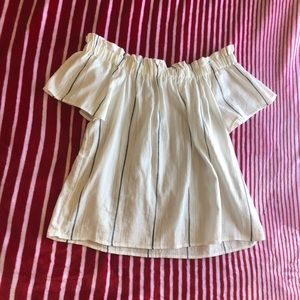 Woman’s strapless off the shoulder top.